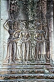 Angkor Wat temple, second enclosure, devatas sculpted in bas-relief with an extraordinary variety of intricate hair styles and costumes. 